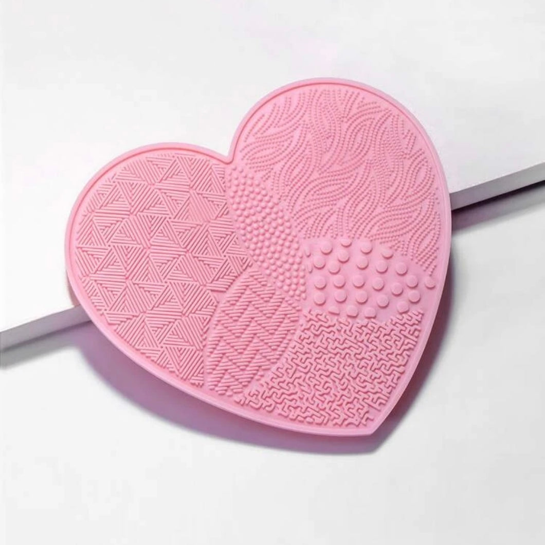 Makeup brush cleaning pad